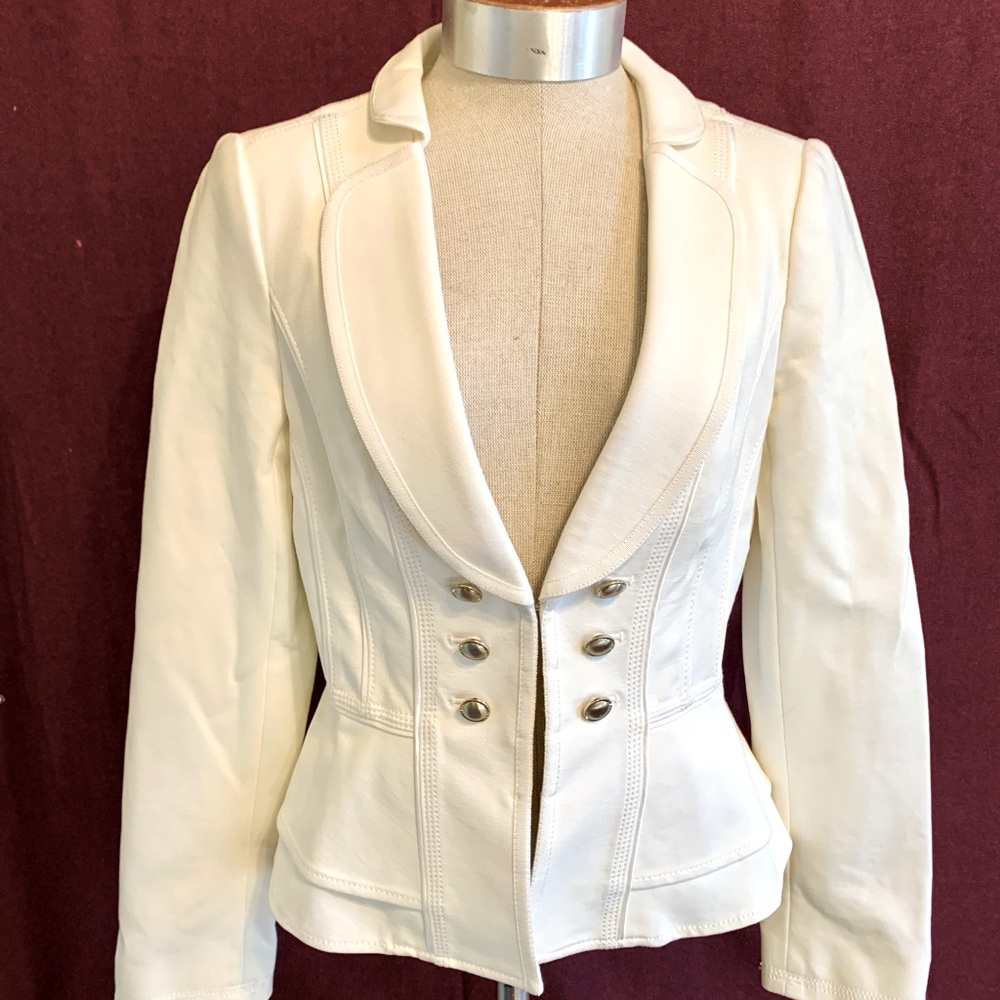 Practically new women’s size 4 short dress blazer. Cream colored